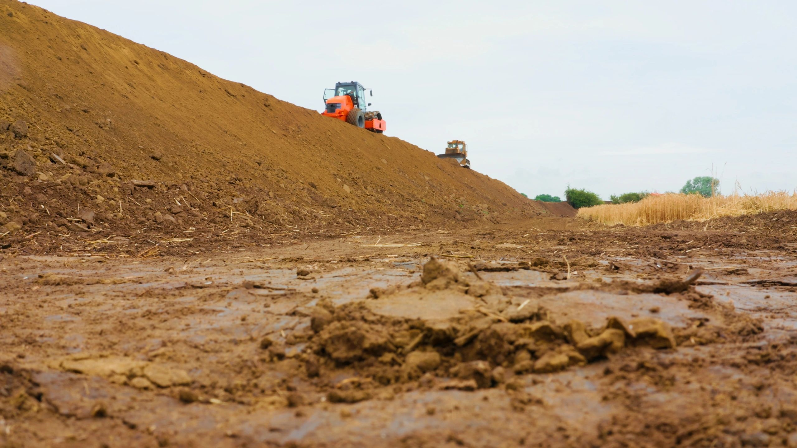 Excavator preparing a construction site